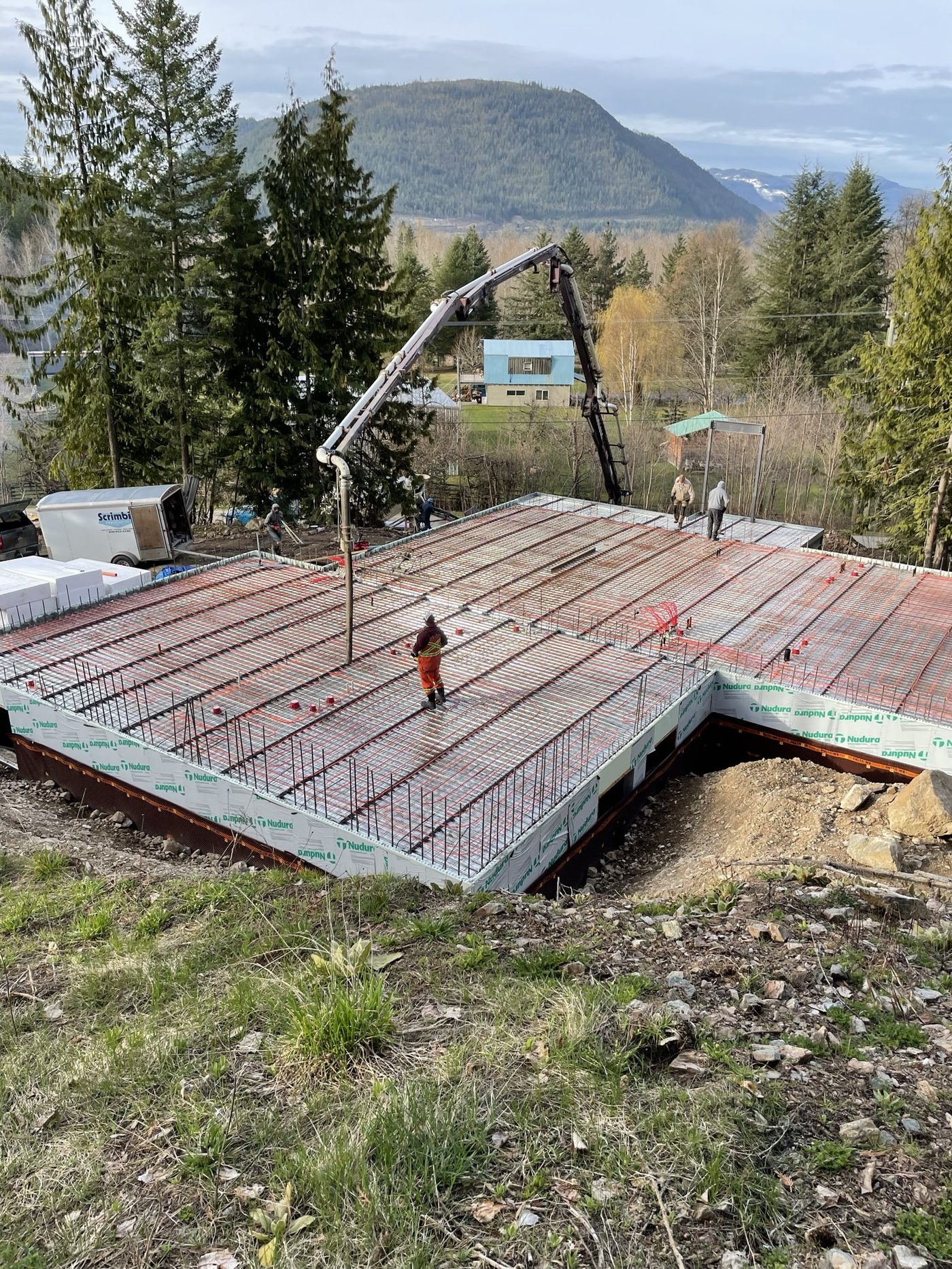 Crane placing structural components on site